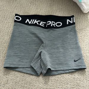 Grey Nike pros. Size medium